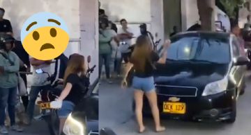 VIDEO | Hija descubre amante de su padre y le rompe el coche en plena calle